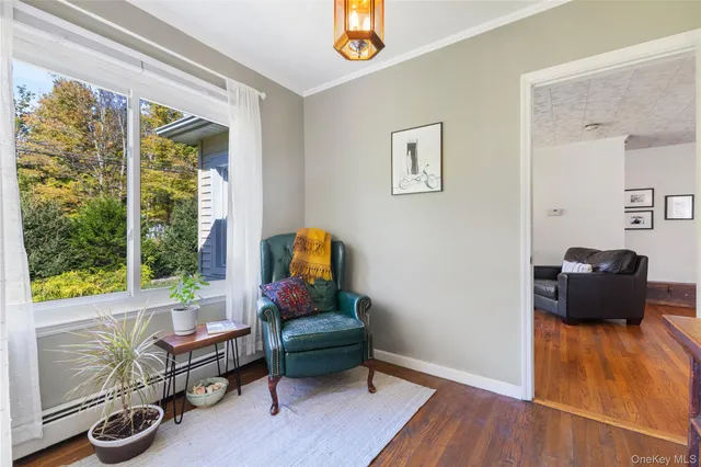 a living room with furniture and a window