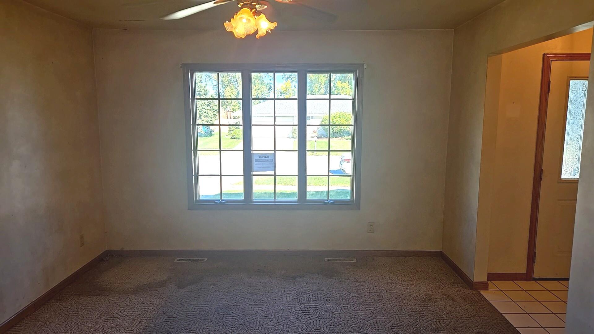 1951 West Ash Street Griffith, IN 46319 - Photo 9 of 23 an empty room with a window