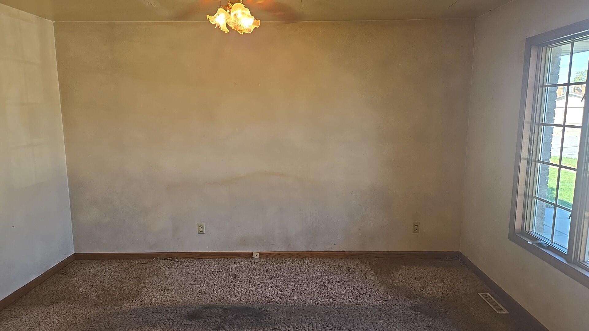 1951 West Ash Street Griffith, IN 46319 - Photo 10 of 23 an empty room with a window