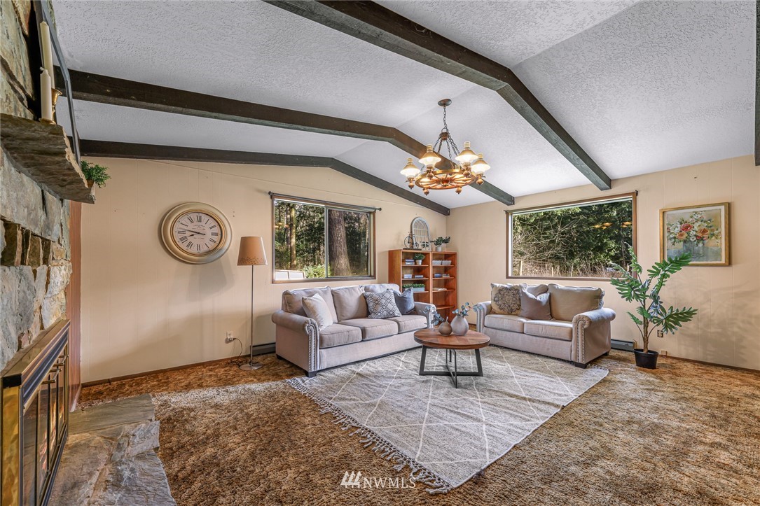 1844 Matz Road Ferndale, WA 98248 - Photo 17 of 39 a living room with furniture and a large window