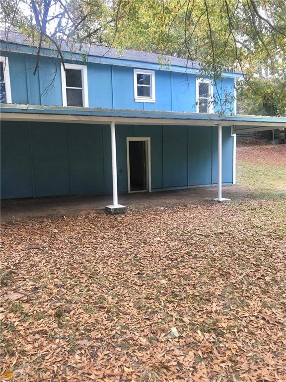116 Edwards Street Bremen, GA 30110 - Photo 6 of 33 a front view of a house with a garden