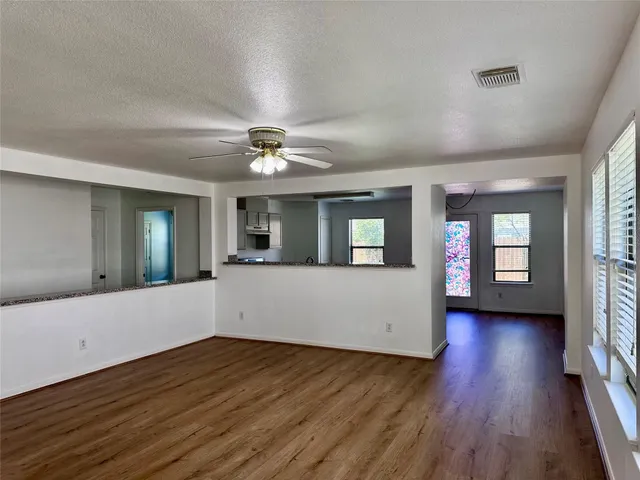 a bathroom with a toilet sink and a mirror