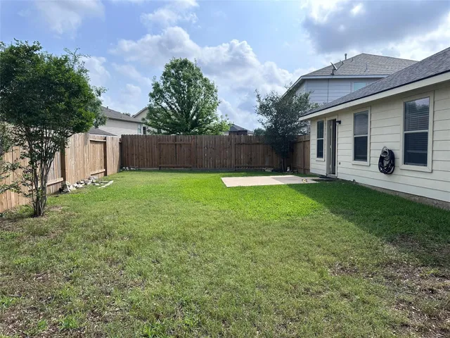 a view of a backyard with a garden