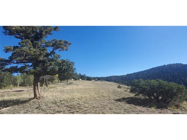 a view of an outdoor space and mountain view