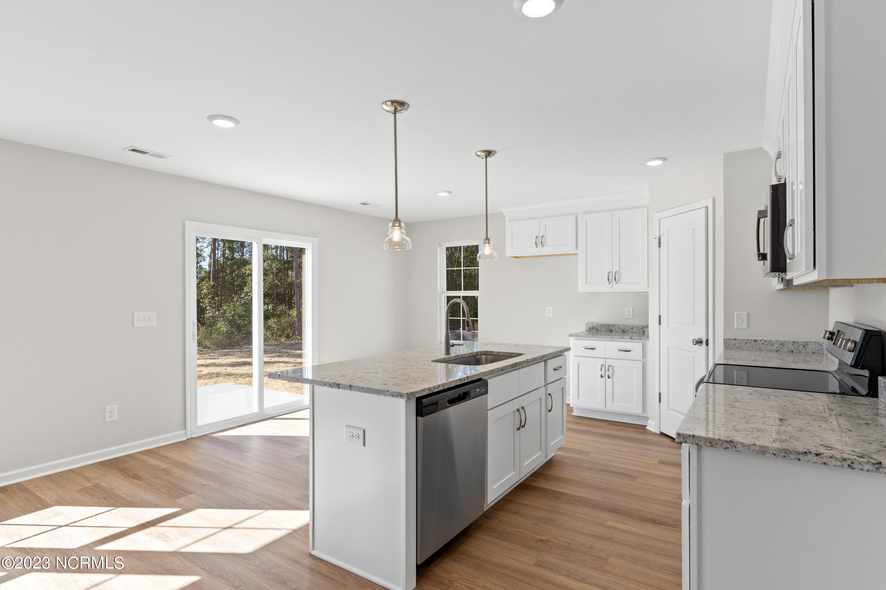 198 Priscilla Place Hampstead, NC 28443 - Photo 12 of 57 Similar to photos - This home is being offered with a bonus room above the garage.