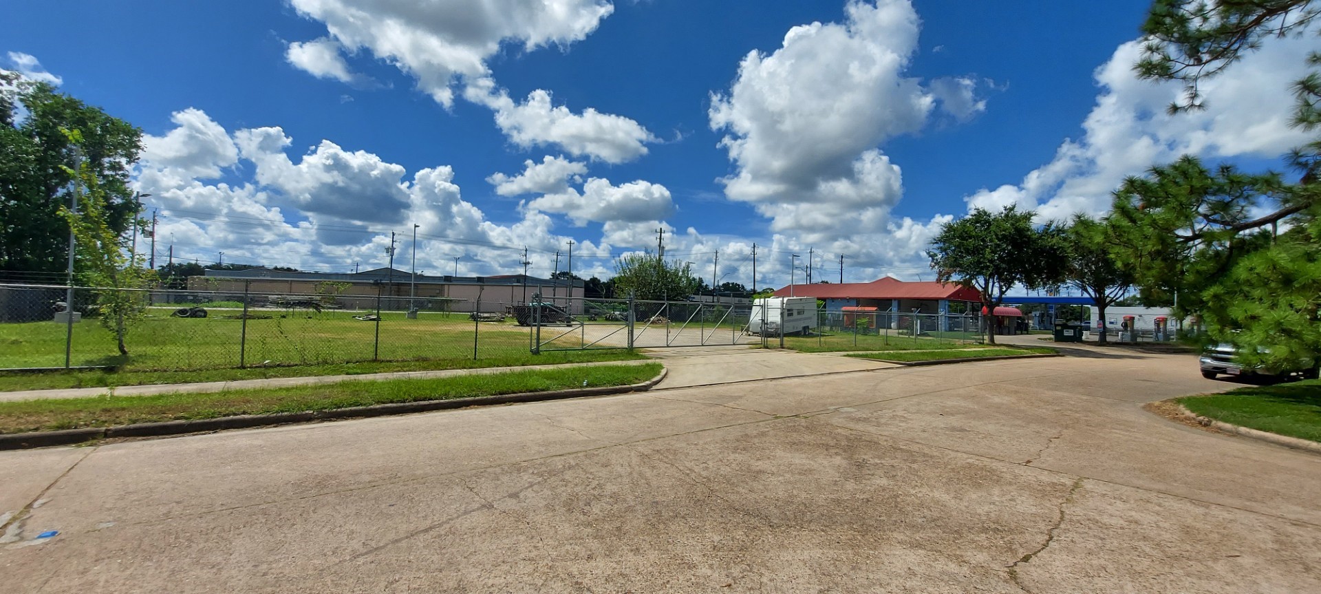 10018 Ramey Street Houston, TX 77075 - Photo 12 of 14 a view of a house with a big yard and a large tree