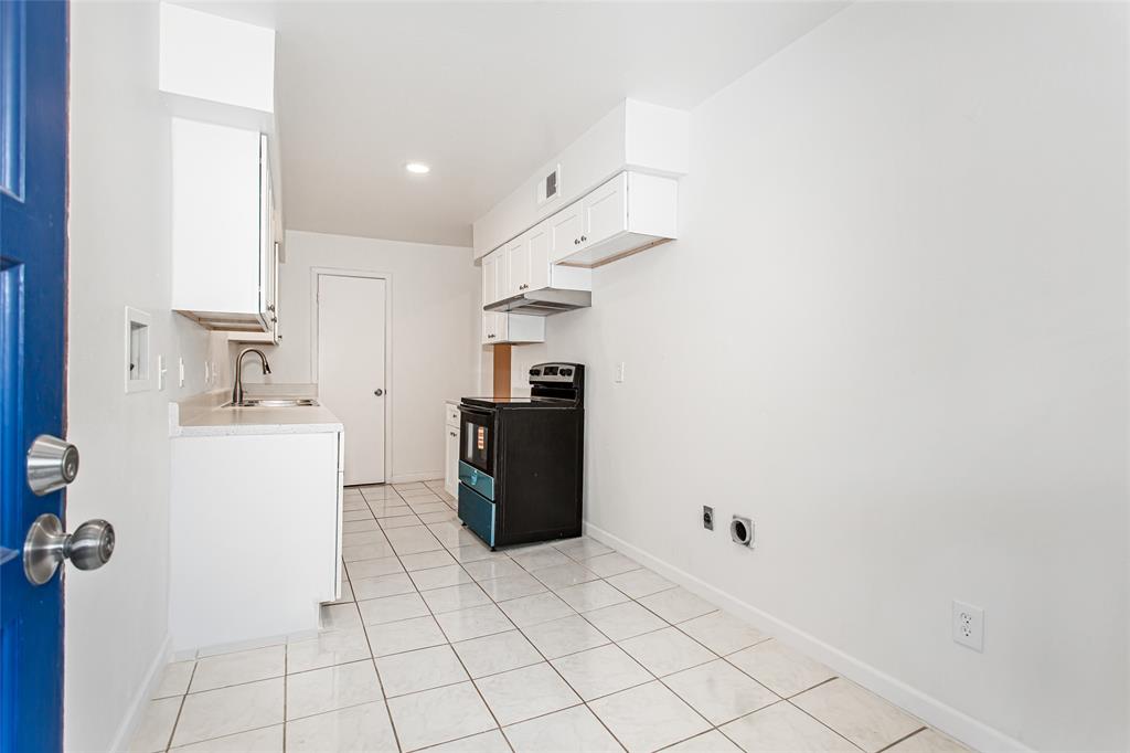 6061 Milton Street, Unit 231 Dallas, TX 75206 - Photo 10 of 27 Dedicated in-unit laundry connections—a valuable convenience not always found in comparable condo offerings.