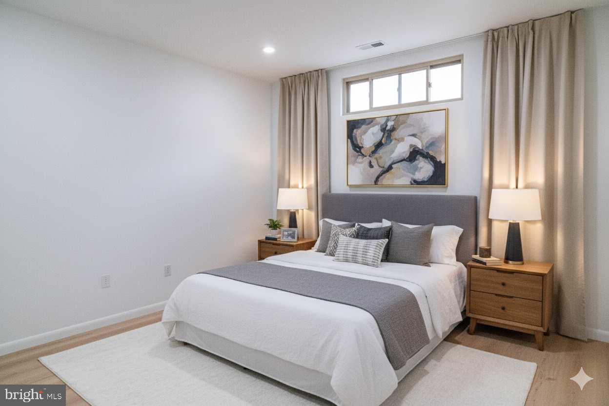 7248 Rising Sun Avenue Philadelphia, PA 19111 - Photo 2 of 25 a bedroom with a large bed and a window