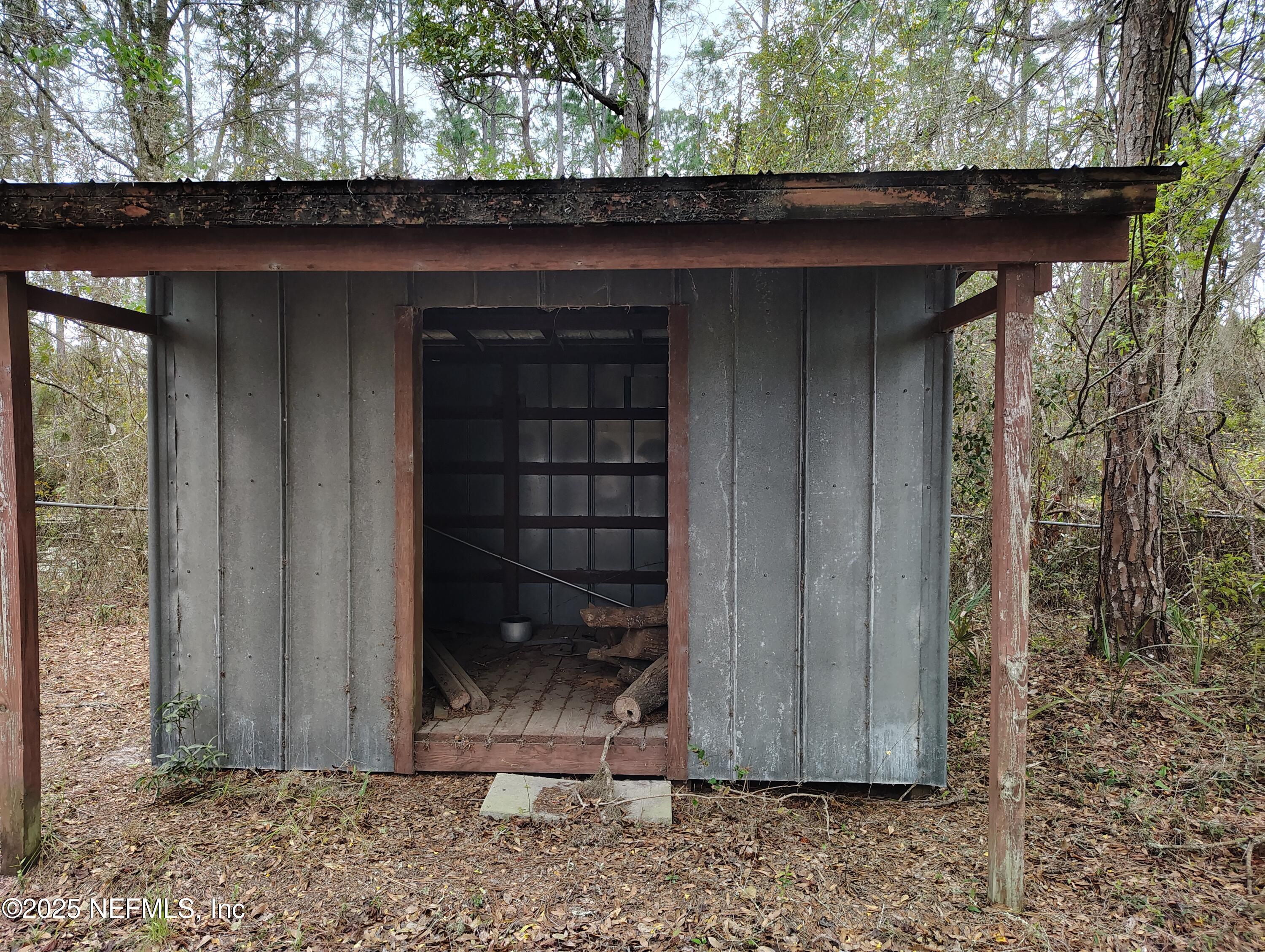 107 Peebles Road Interlachen, FL 32148 - Photo 25 of 41 Woodshed