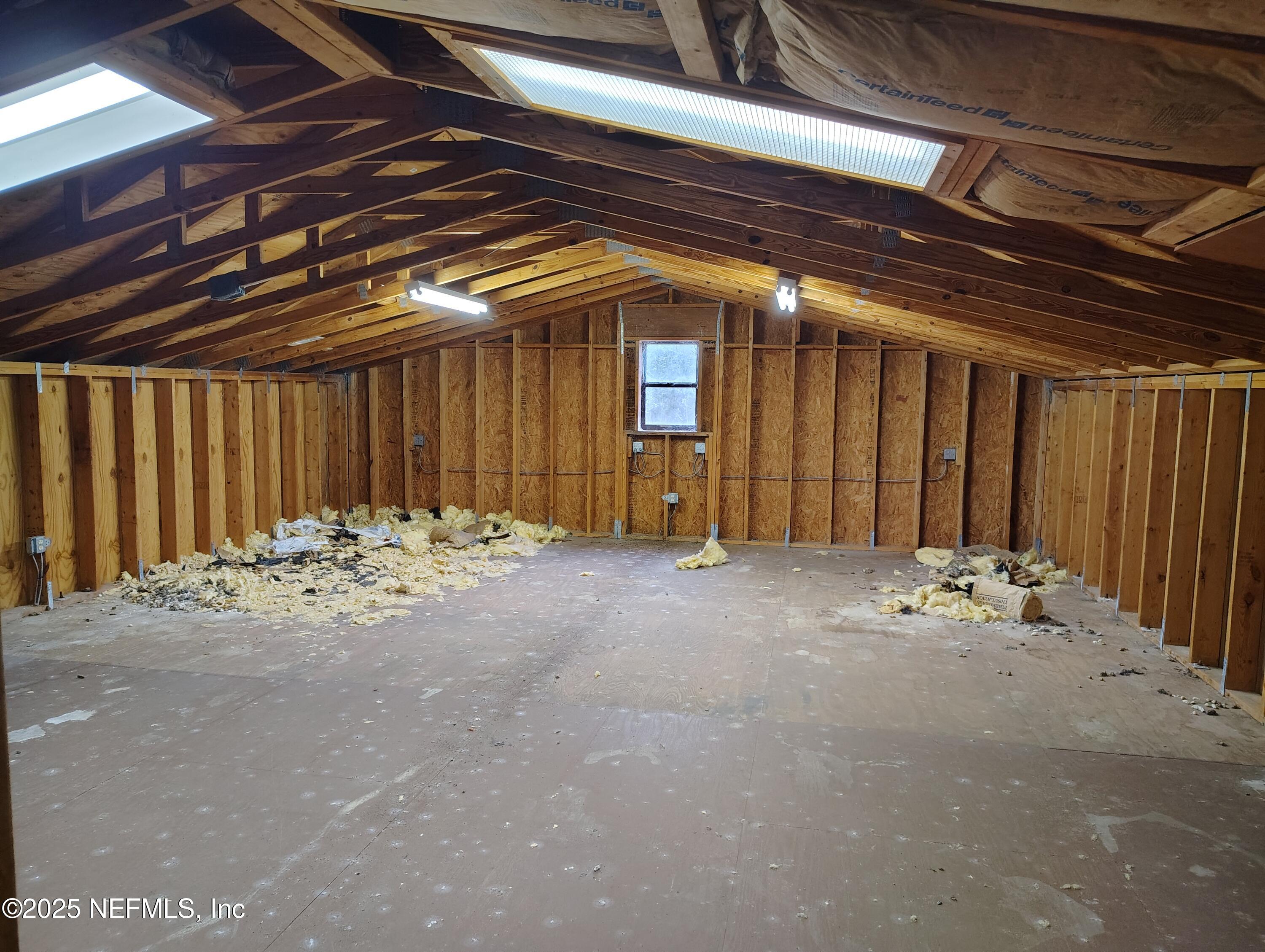 107 Peebles Road Interlachen, FL 32148 - Photo 36 of 41 Above the Garage