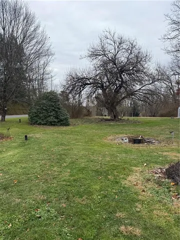 a view of a garden with an outdoor space