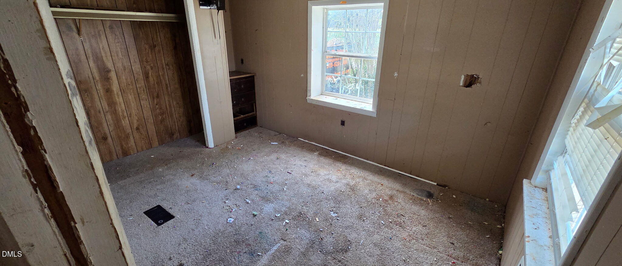 484 Yellow Skin Road Autryville, NC 28318 - Photo 6 of 24 a view of an empty room with a window