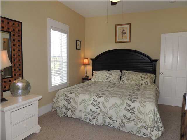 134 Somerset Bridge Road Santa Rosa Beach, FL 32459 - Photo 14 of 36 a bedroom with a bed and window