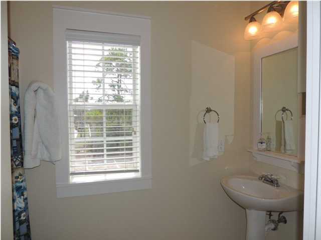 134 Somerset Bridge Road Santa Rosa Beach, FL 32459 - Photo 19 of 36 a bathroom with a sink a toilet and shower