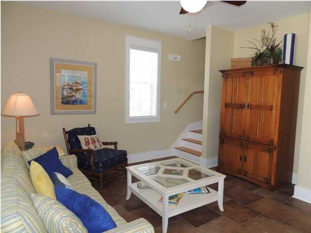 134 Somerset Bridge Road Santa Rosa Beach, FL 32459 - Photo 8 of 36 a living room with furniture a window and a table