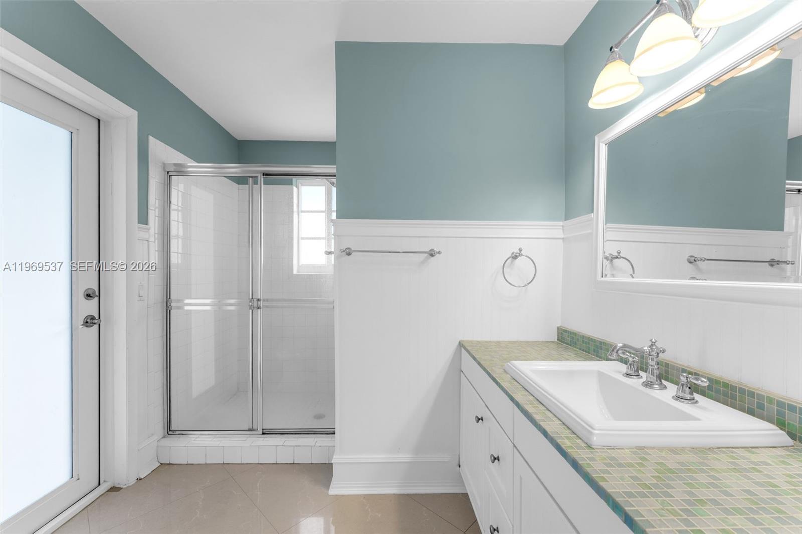 7451 Southwest 133rd Street Pinecrest, FL 33156 - Photo 24 of 36 Shared bathroom with bedroom 3 and 4