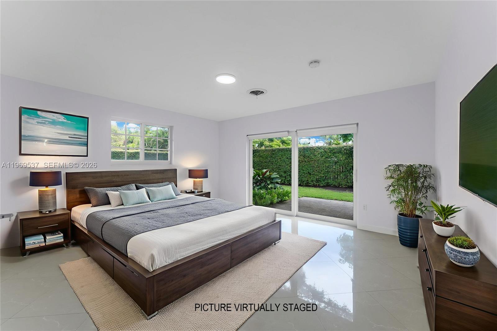 7451 Southwest 133rd Street Pinecrest, FL 33156 - Photo 6 of 36 Second large bedroom with attached batj