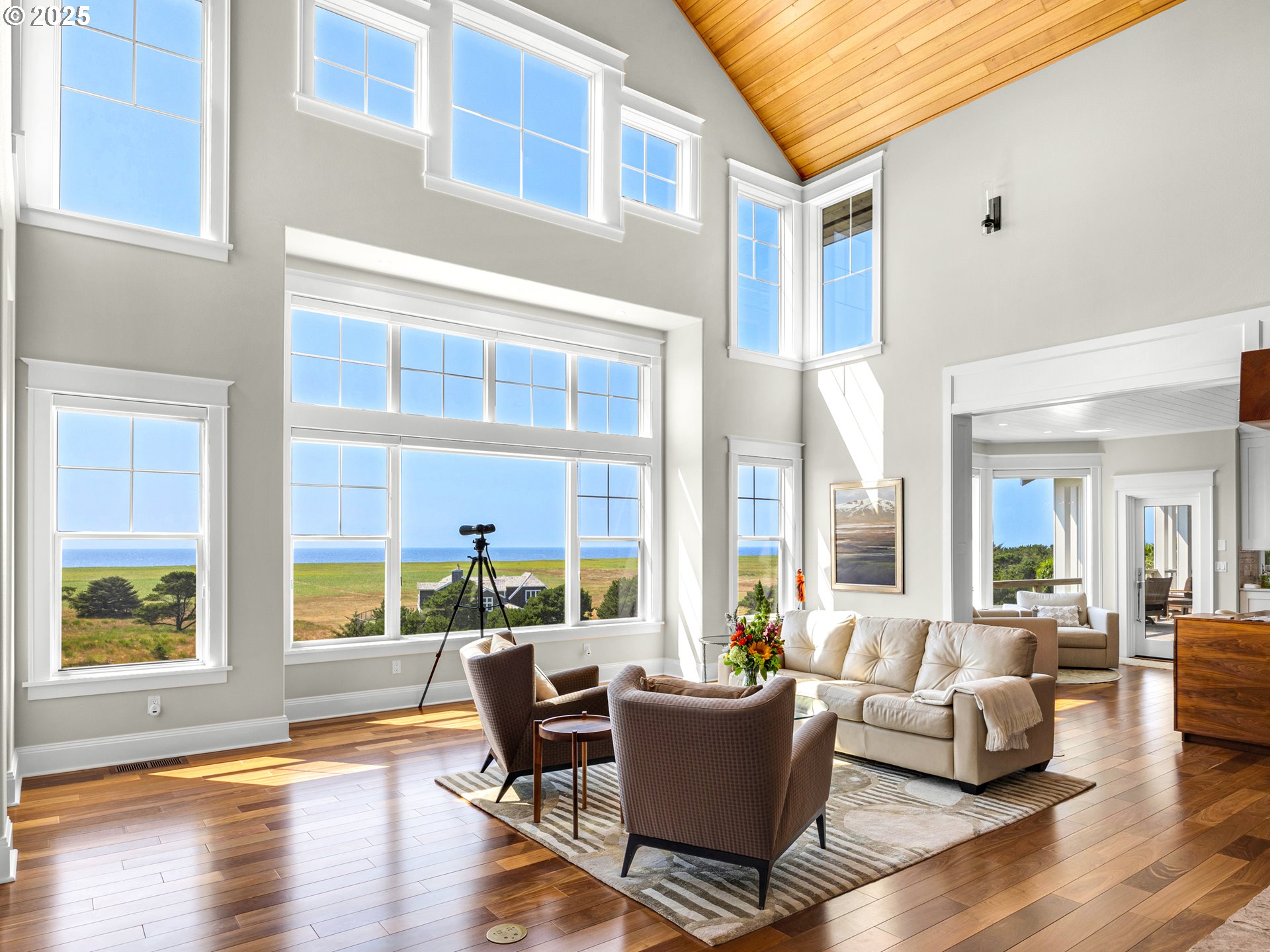89062 Pinehurst Road Gearhart, OR 97138 - Photo 8 of 42 a living room with furniture and a large window