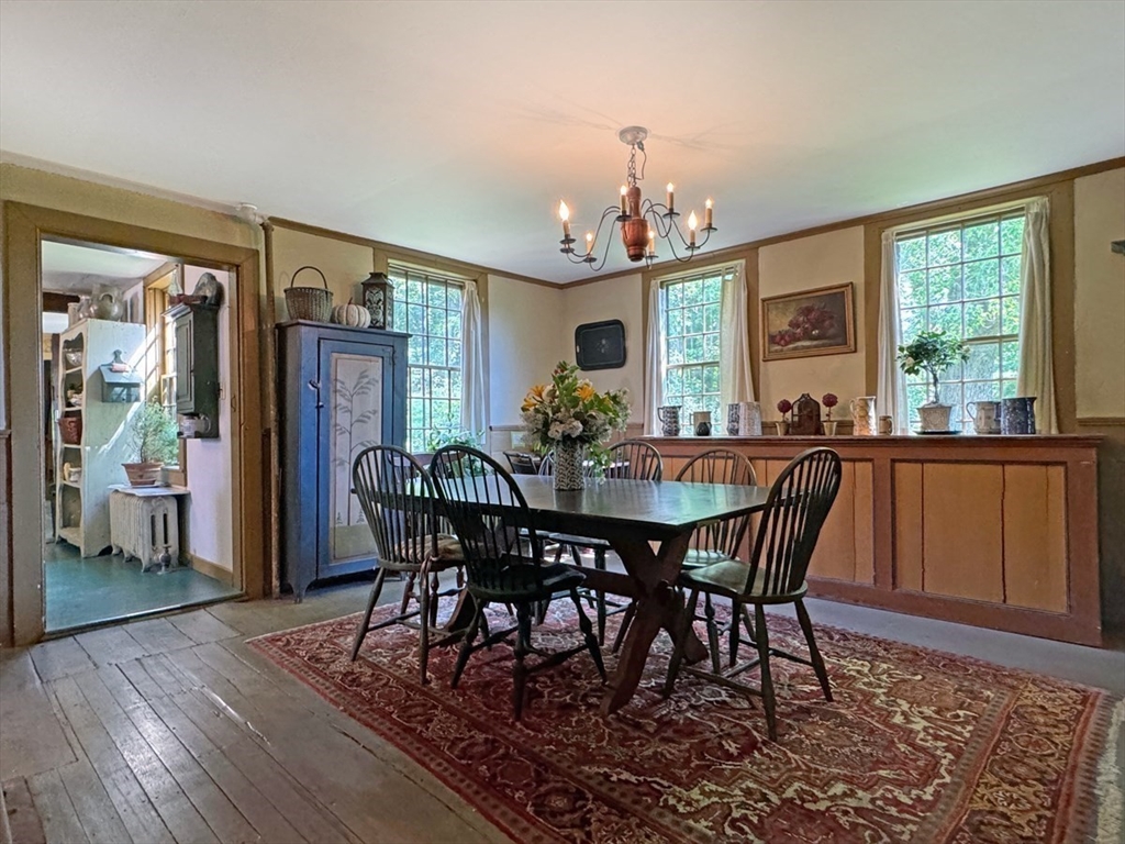 89 Wanamaker Road Northfield, MA 01360 - Photo 11 of 42 a view of a dining room with furniture window and wooden floor