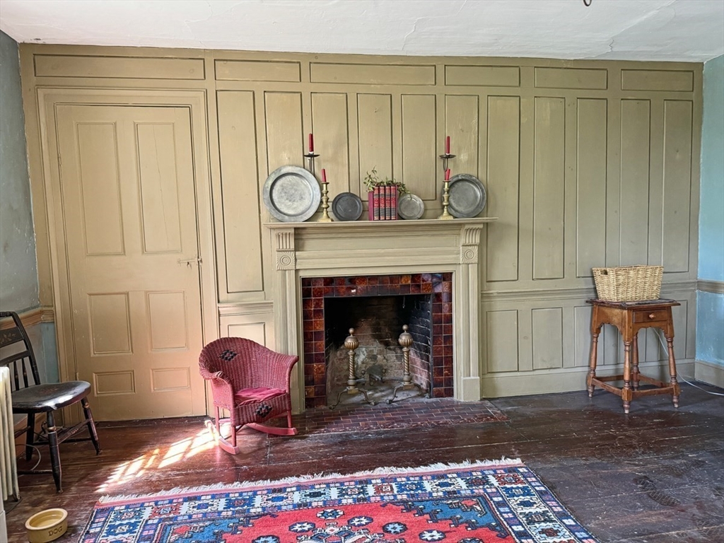 89 Wanamaker Road Northfield, MA 01360 - Photo 17 of 42 a living room with furniture and a fireplace