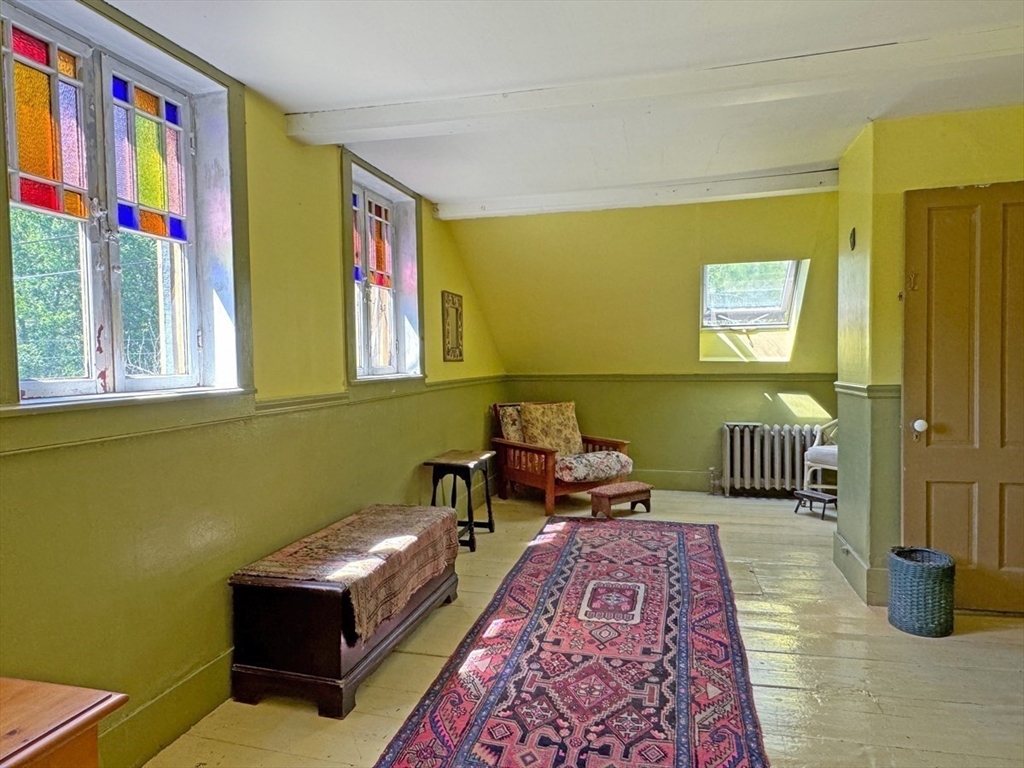 89 Wanamaker Road Northfield, MA 01360 - Photo 20 of 42 a room with furniture and a window