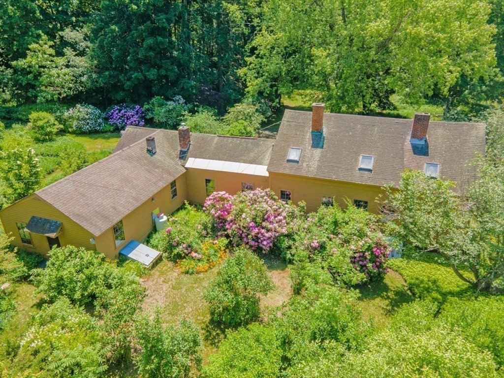 89 Wanamaker Road Northfield, MA 01360 - Photo 31 of 42 aerial view of a house with a yard and garden