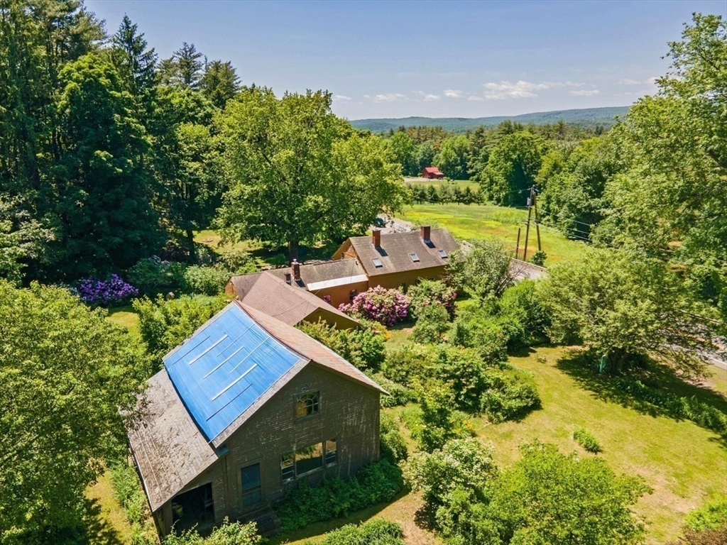 89 Wanamaker Road Northfield, MA 01360 - Photo 33 of 42 an aerial view of a house with garden space and street view