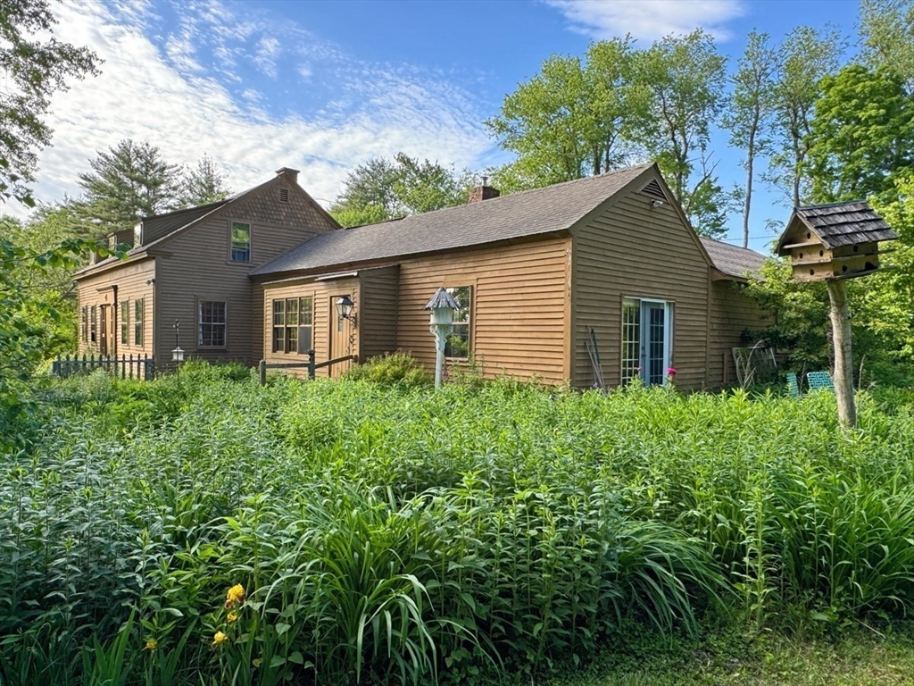 89 Wanamaker Road Northfield, MA 01360 - Photo 4 of 42 a house that has a lot of plants in it