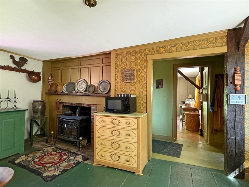 89 Wanamaker Road Northfield, MA 01360 - Photo 5 of 42 a view of room with furniture and a fireplace