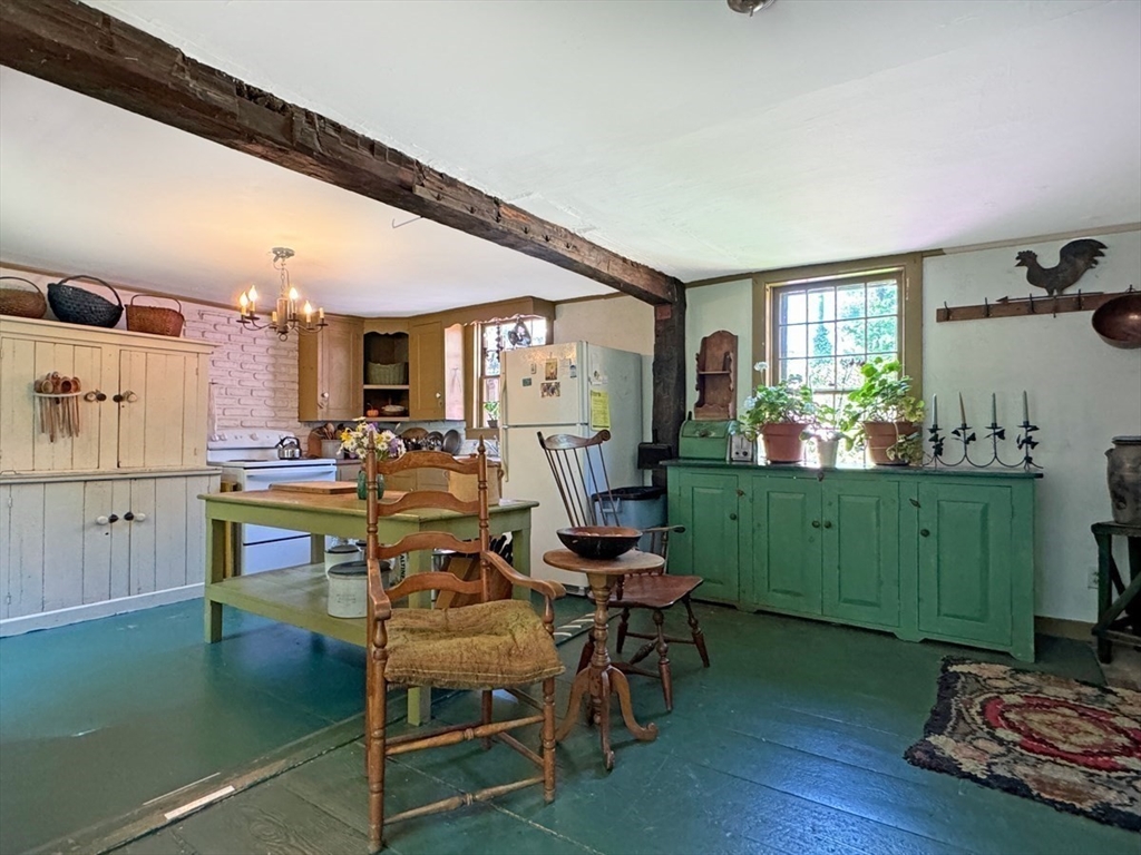 89 Wanamaker Road Northfield, MA 01360 - Photo 9 of 42 a view of a dining room with furniture window and outside view