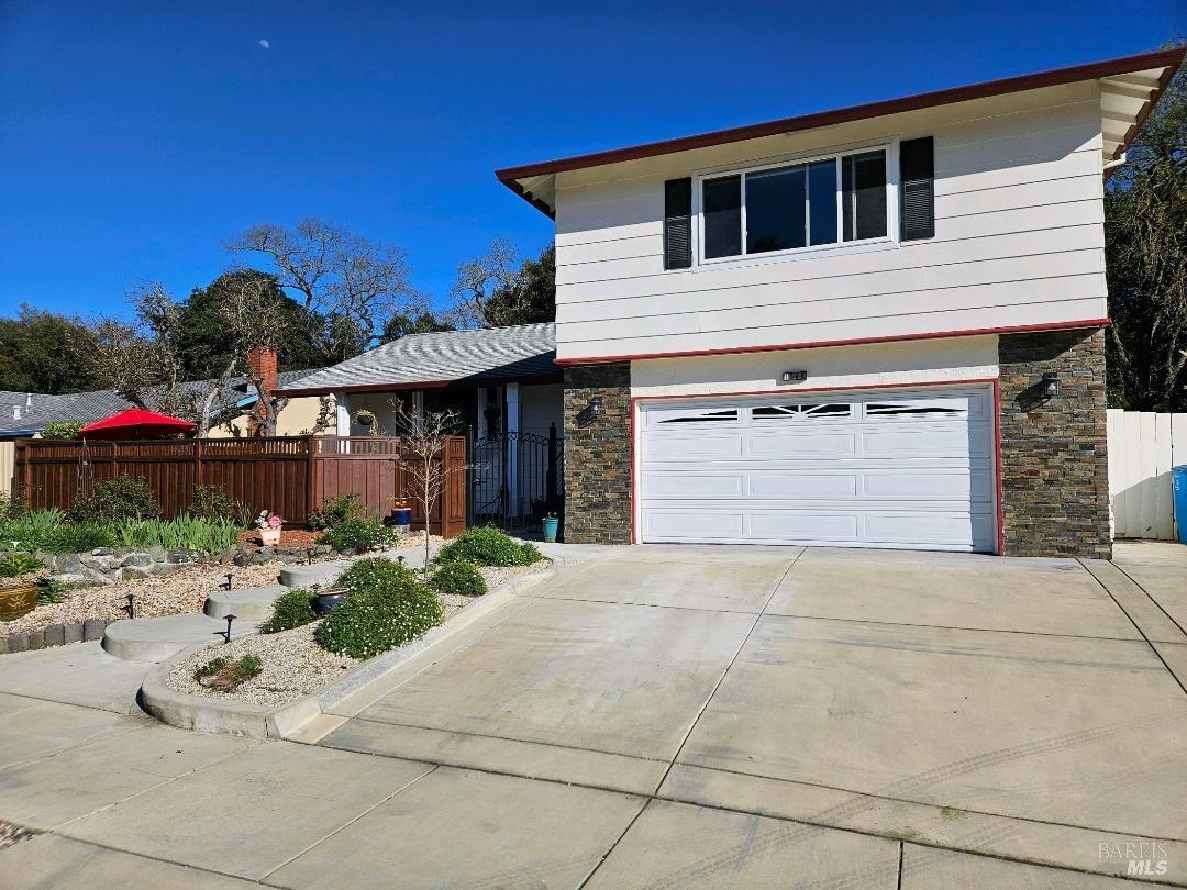 1564 Cunningham Way Santa Rosa, CA 95403 - Photo 1 of 1 a front view of a house with a garage