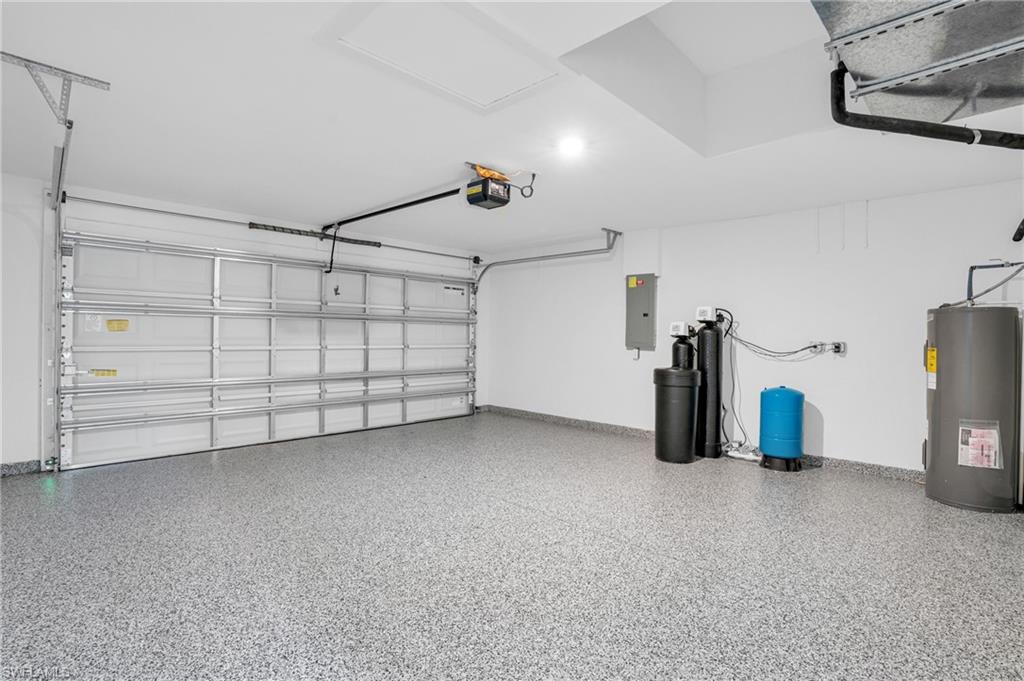 2719 29th Street Southwest Lehigh Acres, FL 33976 - Photo 16 of 23 a view of a garage room