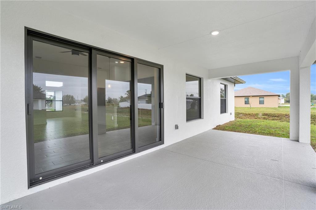 2719 29th Street Southwest Lehigh Acres, FL 33976 - Photo 18 of 23 a view of a garden from a room