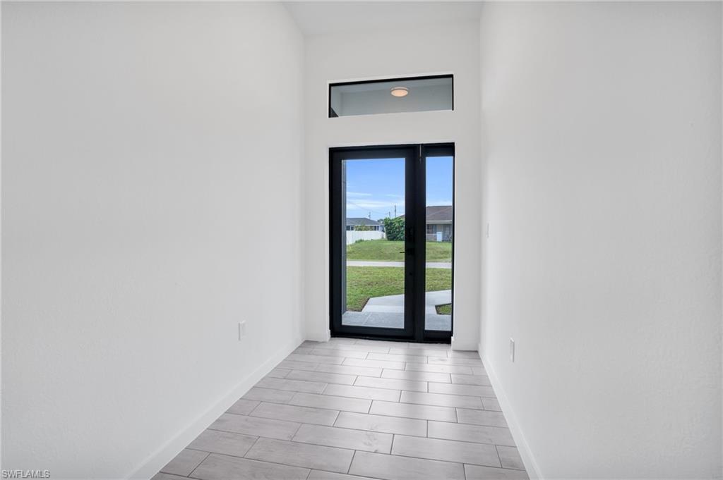 2719 29th Street Southwest Lehigh Acres, FL 33976 - Photo 21 of 23 a view of an entryway door