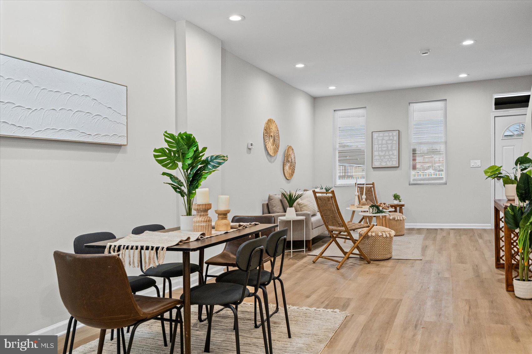 13 South Hilton Street Baltimore, MD 21229 - Photo 14 of 48 a view of a dining room with furniture and wooden floor