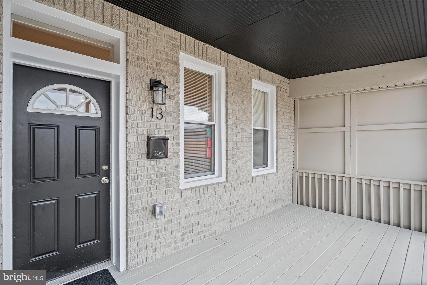 13 South Hilton Street Baltimore, MD 21229 - Photo 2 of 48 a view of front door of a house