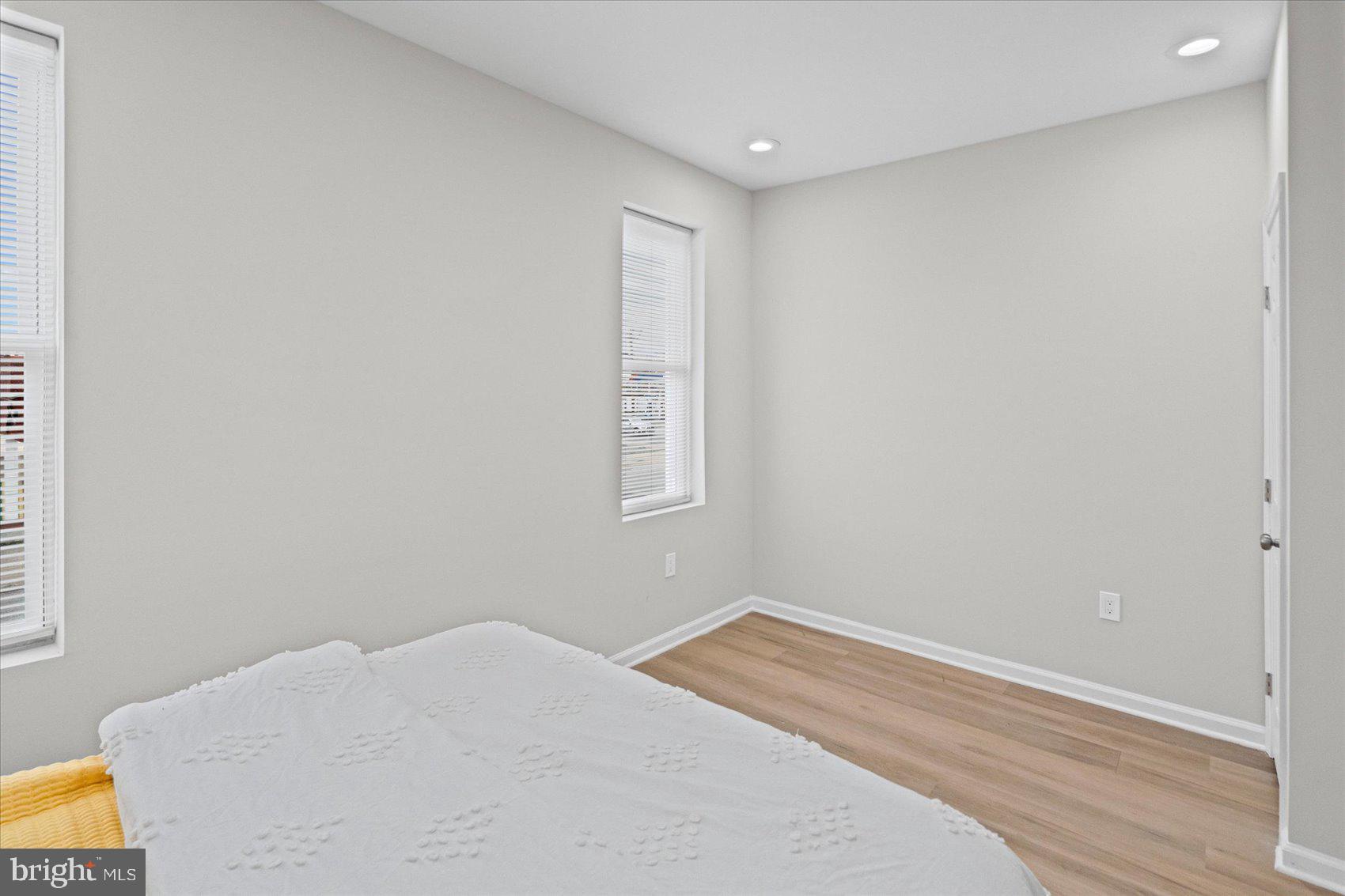 13 South Hilton Street Baltimore, MD 21229 - Photo 35 of 48 a bedroom with a bed and a window