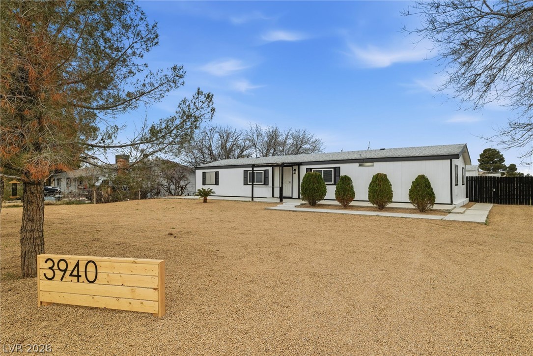 3940 Point Drive Pahrump, NV 89060 - Photo 2 of 35 A charming single-level residence nestled on a spacious, xeriscaped lot.
