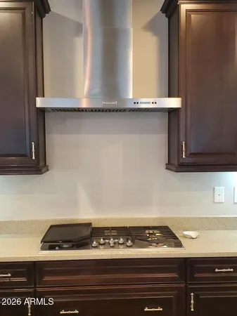 a close view of sink and cabinets