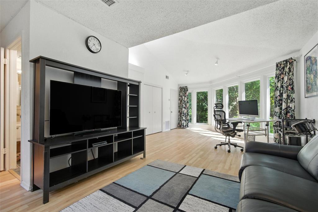 702 Keywe Place Duncanville, TX 75116 - Photo 15 of 40 a living room with furniture and a flat screen tv