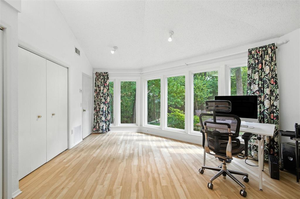 702 Keywe Place Duncanville, TX 75116 - Photo 16 of 40 a view of a workspace with furniture and a window