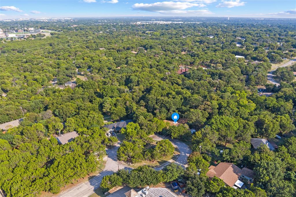 702 Keywe Place Duncanville, TX 75116 - Photo 36 of 40 a view of a city with lush green forest