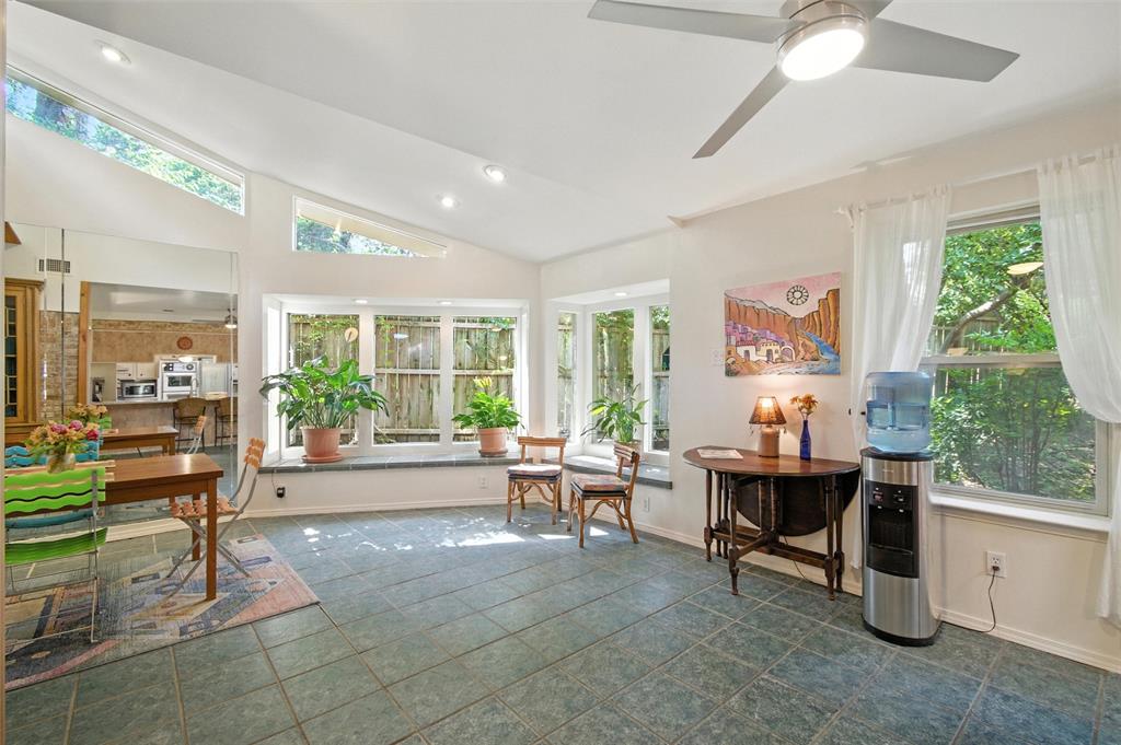 702 Keywe Place Duncanville, TX 75116 - Photo 10 of 40 a living room with furniture and a large window