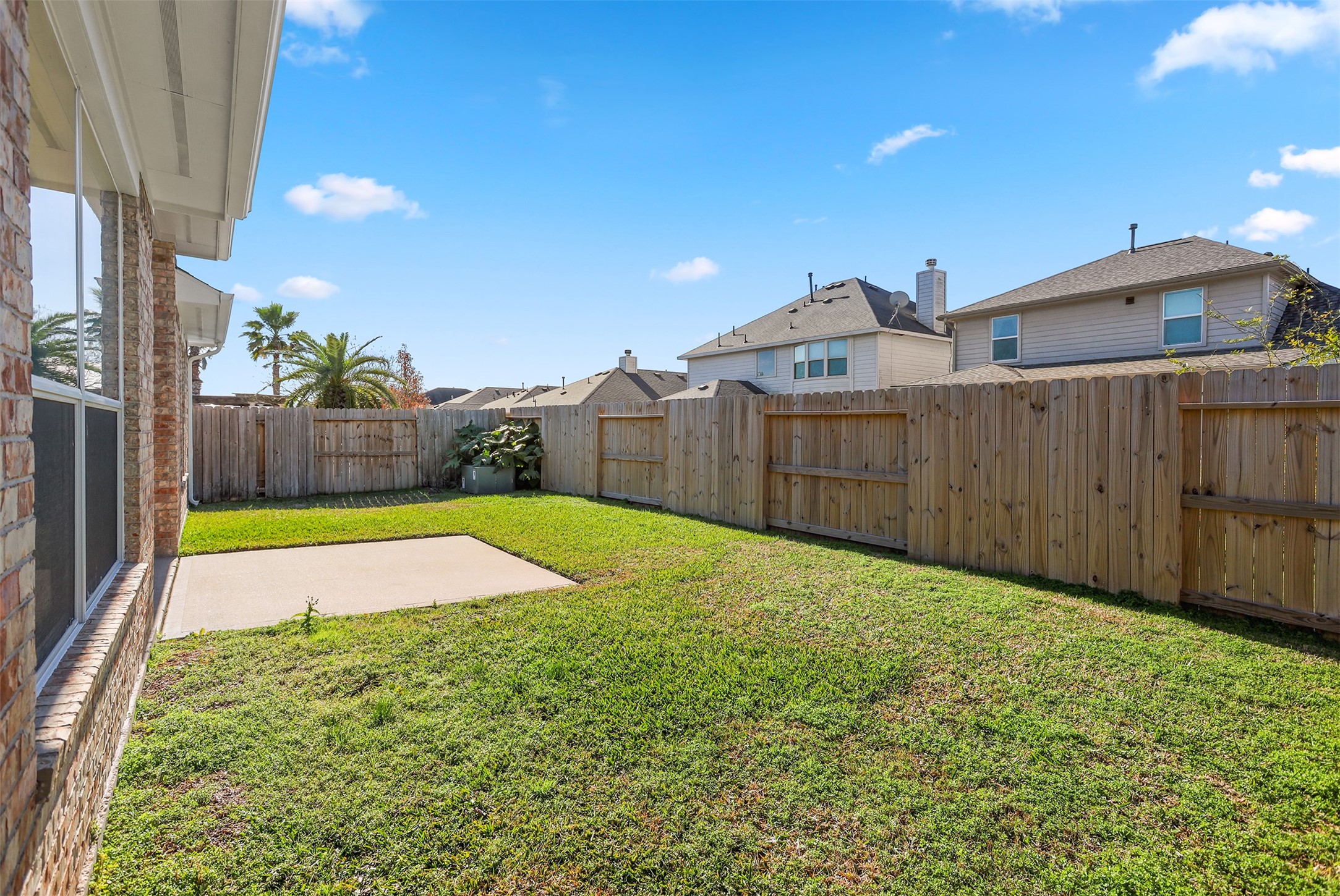 5026 Gulf Stream Lane Bacliff, TX 77518 - Photo 20 of 20 a view of a backyard with a small cabin