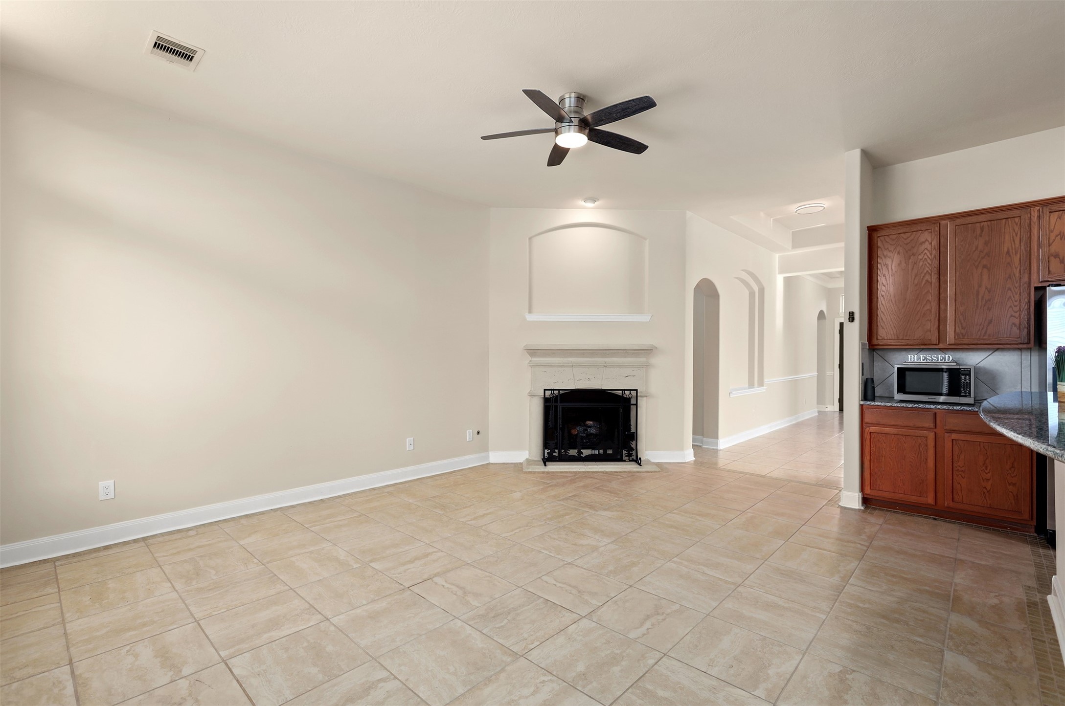 5026 Gulf Stream Lane Bacliff, TX 77518 - Photo 8 of 20 a view of an empty room with a fireplace