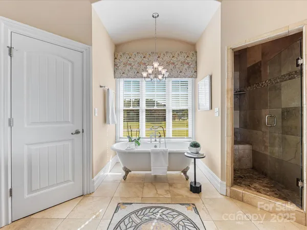 a living room with a bath tub and shower
