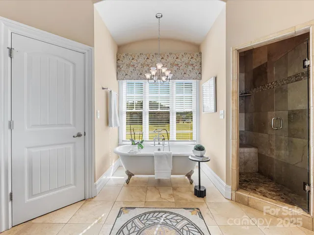 a living room with a bath tub and shower