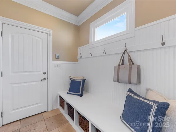 a view of room with window and wooden floor