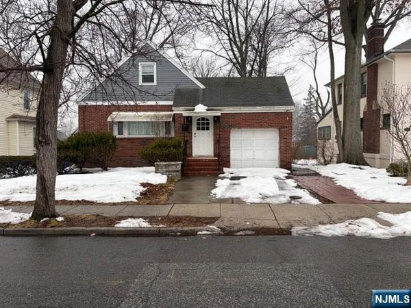 a front view of house with yard