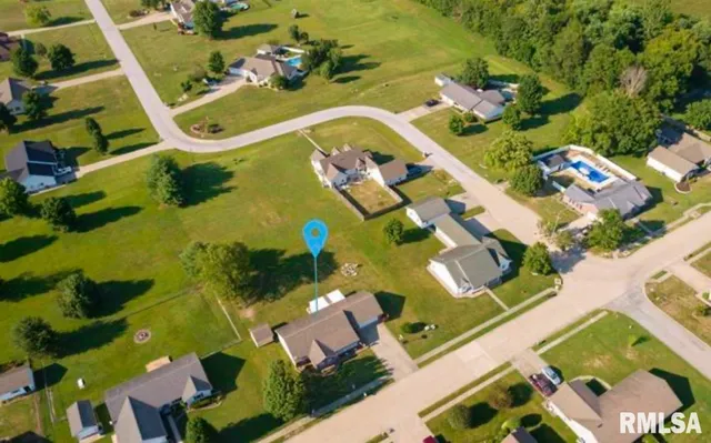 an aerial view of a pool patio swimming pool and outdoor seating